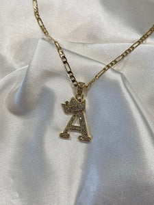 Crown and initial