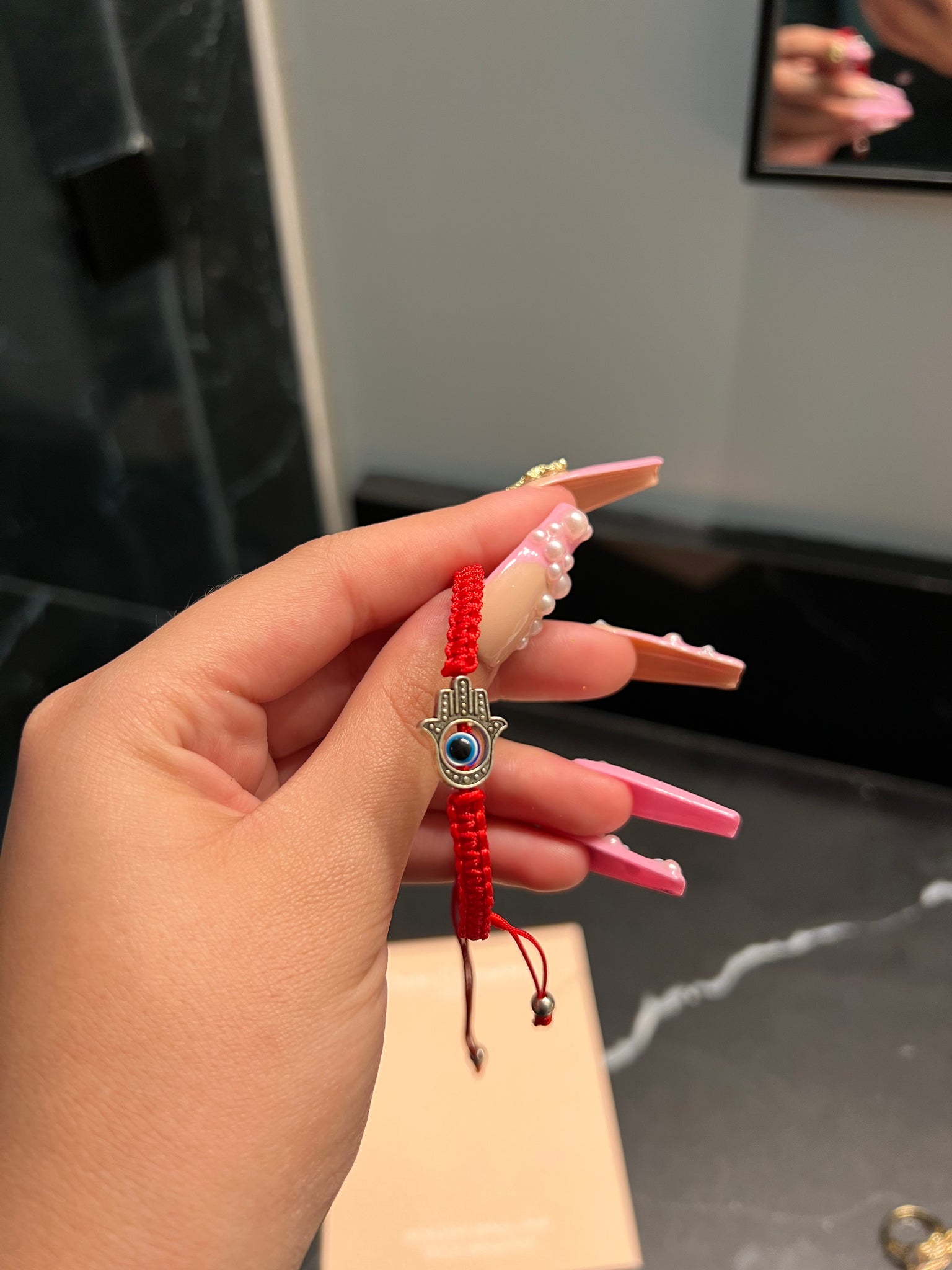 red ojo hand bracelet