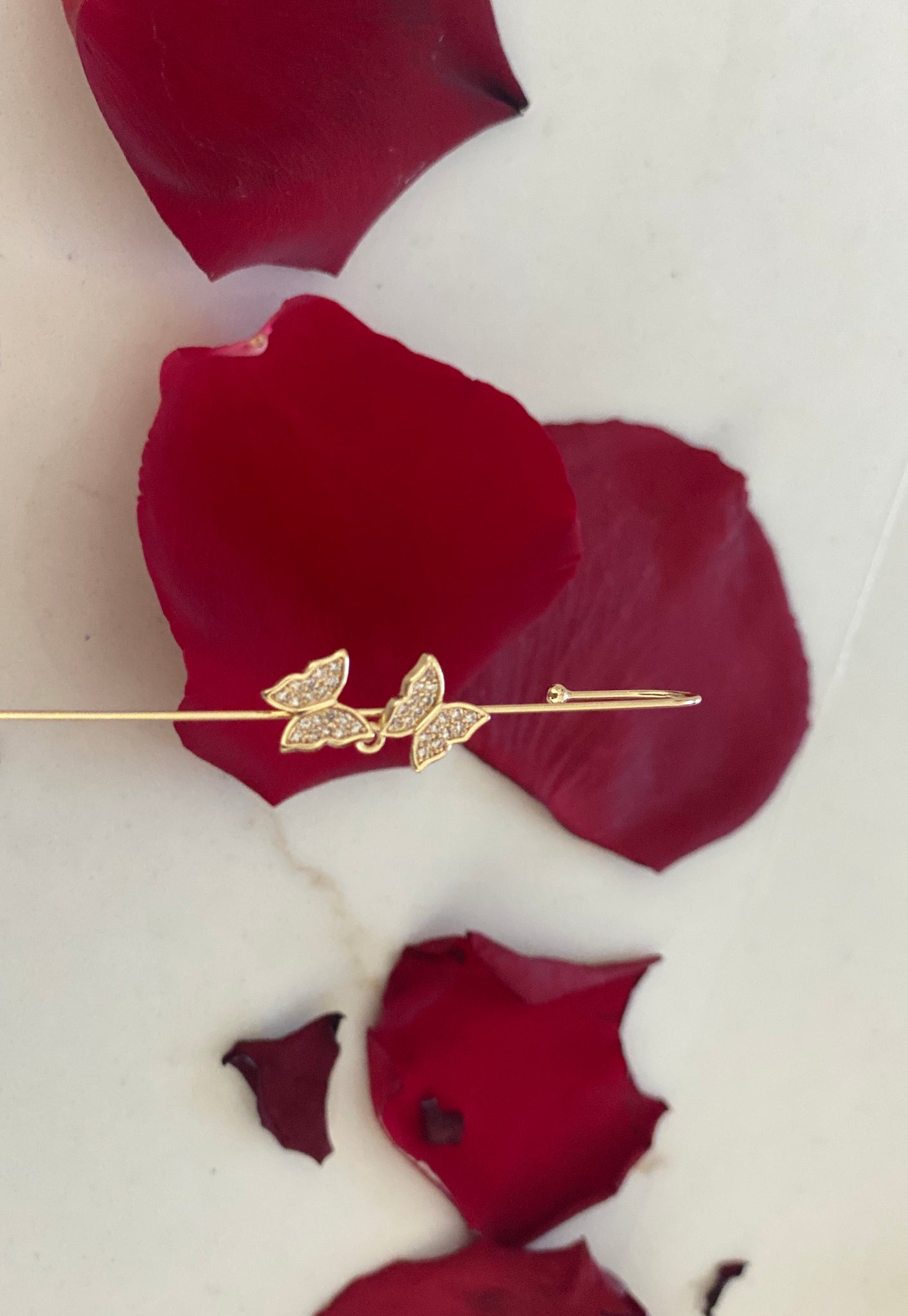 Hanging butterfly ear cuff