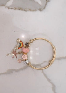 Pink charm bracelet
