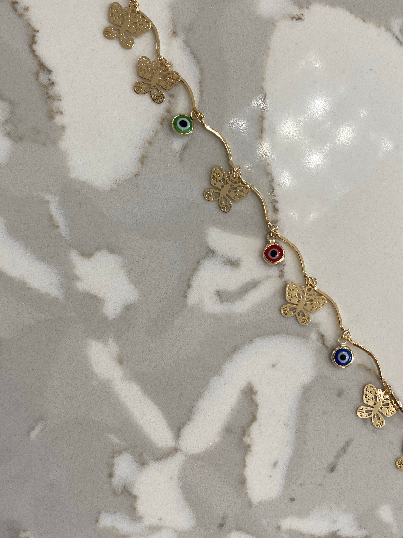 Ojo butterfly bracelet/ anklet